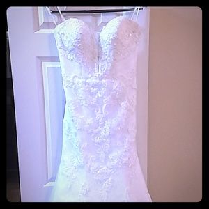 Justin Alexander strapless wedding dress.